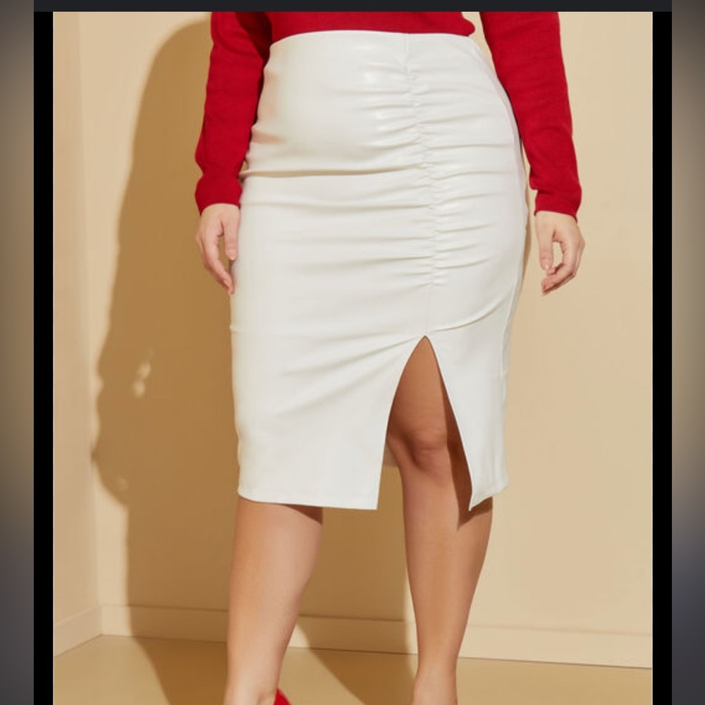 Faux white leather skirt. Never worn with tags!